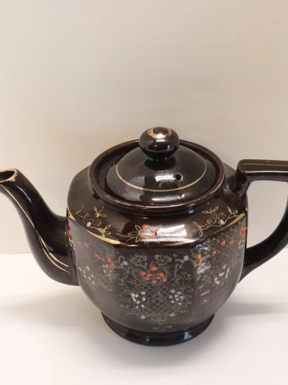 A Porcelain Pitcher made in Japan with Japan Written on Bottom Black